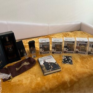 Outlander POP collection with book and Spirit with two cups.